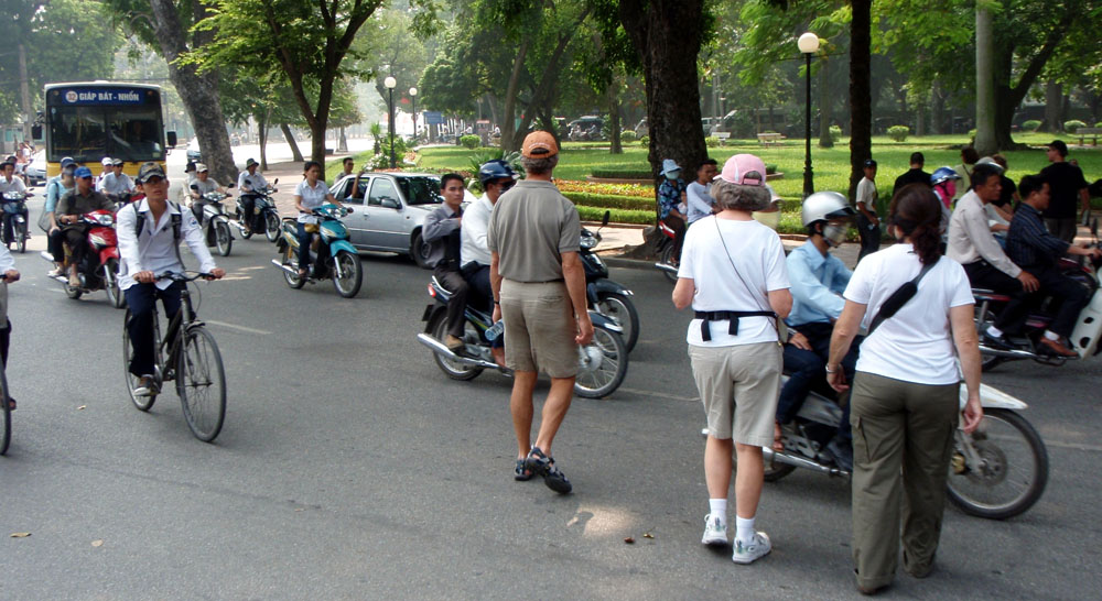 How does the Hanoi tourist cross the road? Very, very carefully